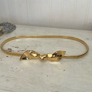 Vintage Accessocraft gold tone bow belt MCM  26”-31”
